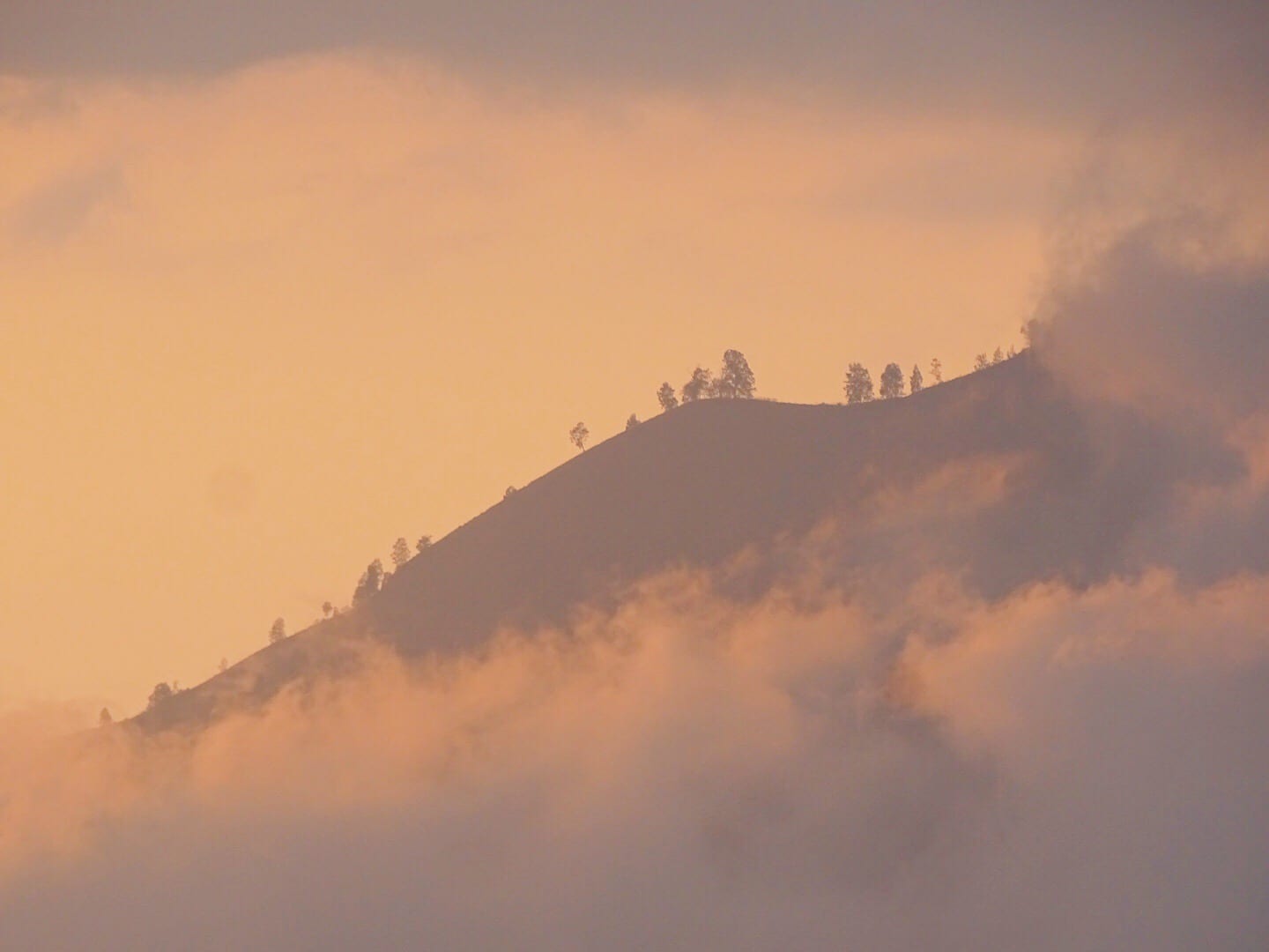 Orange sky over mountains