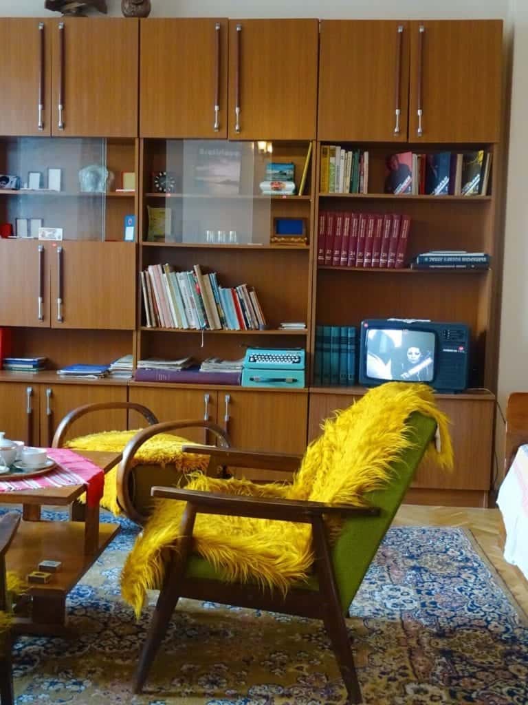 Yellow chair and TV set in old fashioned Red Flat Sofia