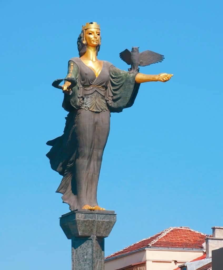 Black and gold goddess statue holding a bird Sofia Bulgaria