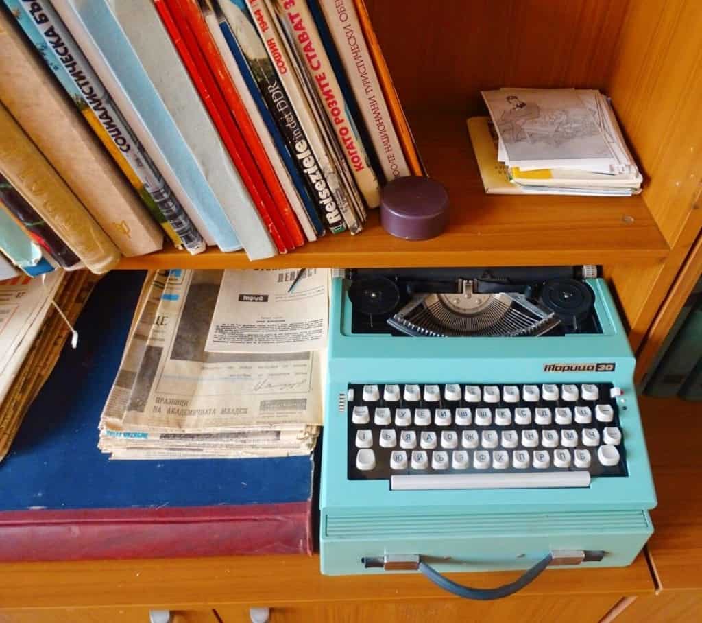 Blue type writer and books Red flat Sofia