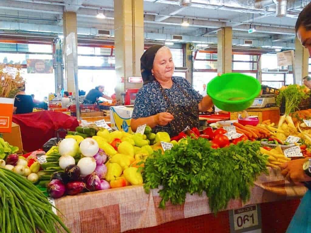 Lady selling fruit Obar Market Bucharest 