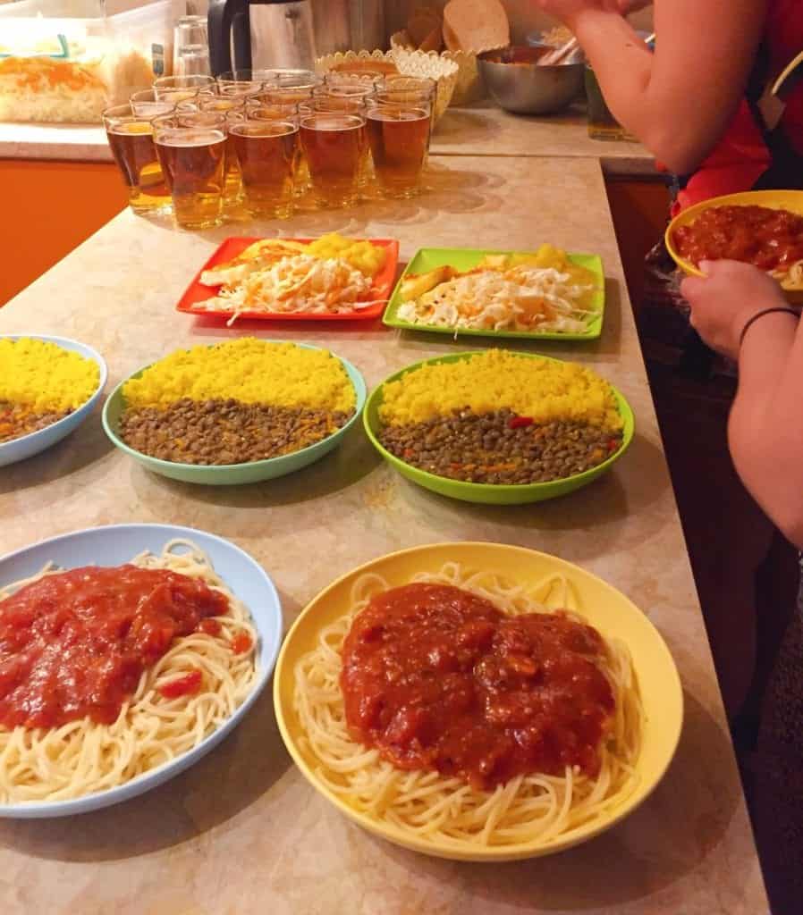 Plates of pasta and curry at Hostel Mostel Sofia Bulgaria