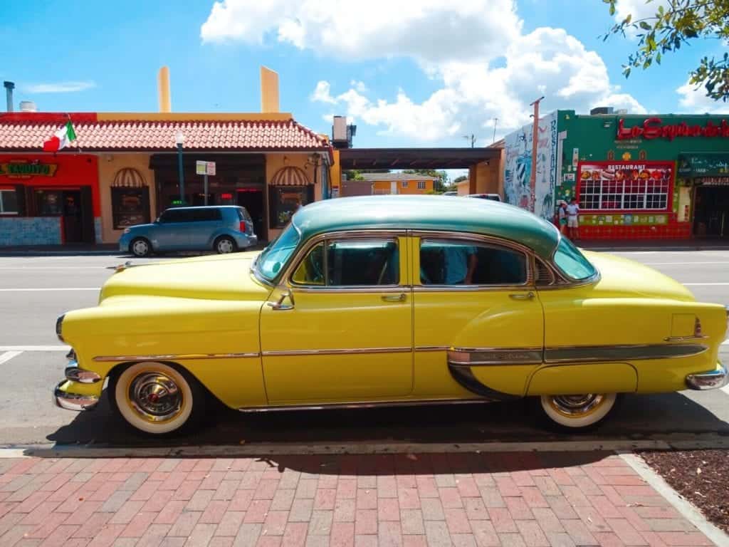 Old fashioned yellow car in Little Havana Miami