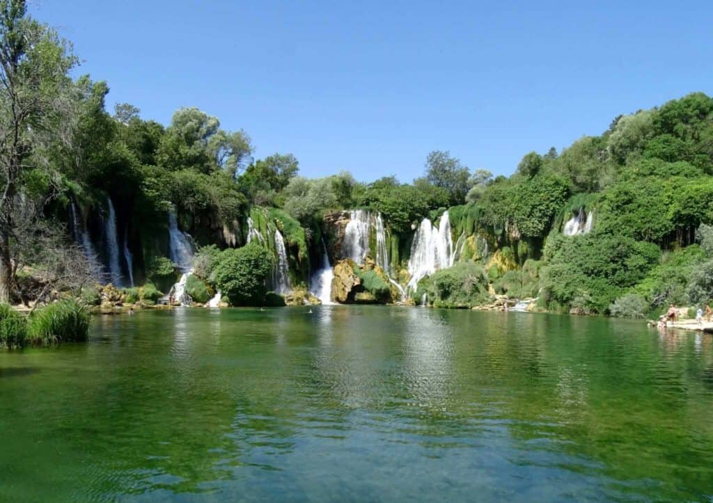 Waterfalls and clear empty waters at Kravice Falls