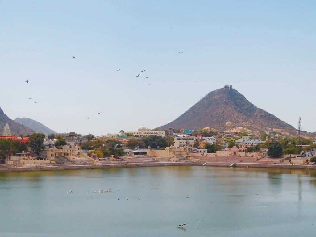 Peaceful Pushkar lake with mountain background