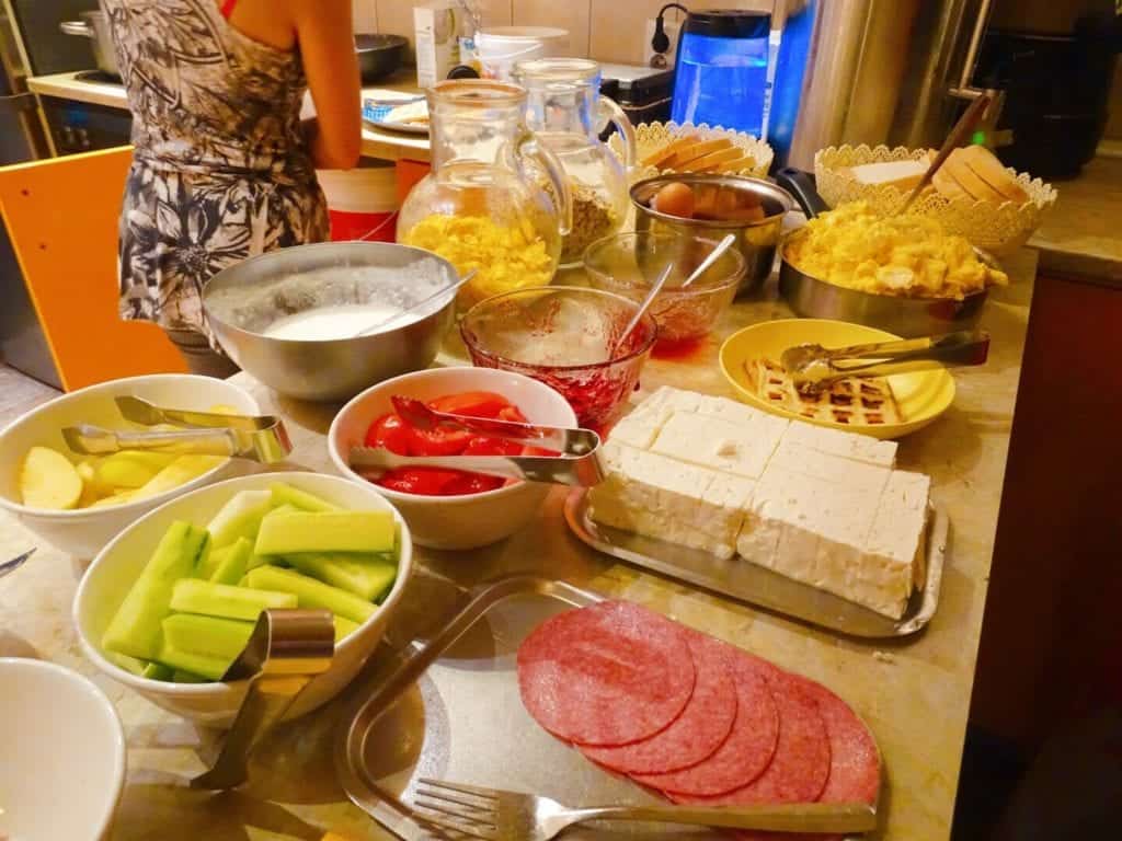 Plates of meat and cheese at Hostel Mostel Sofia Bulgaria
