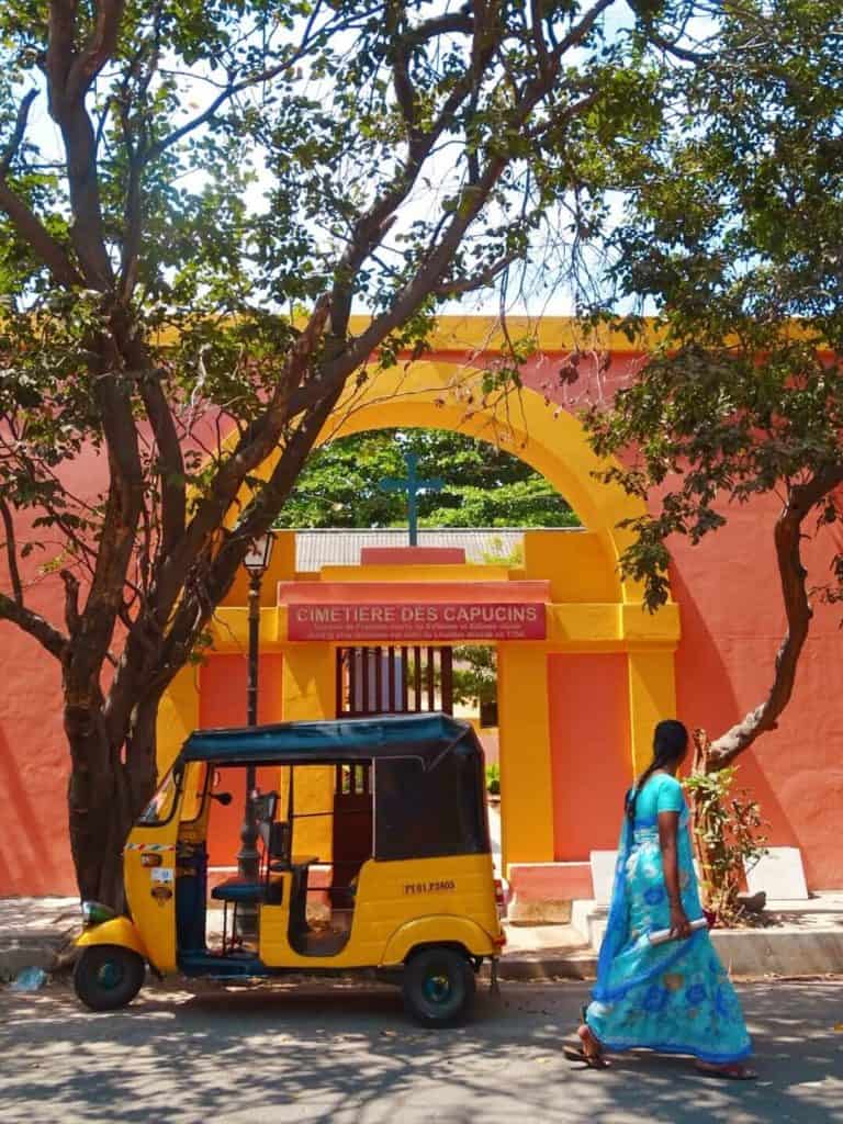 Woman in blue saree walking through Pondicherry 