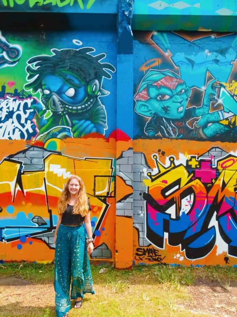 Girl with street art backdrop Bangkok