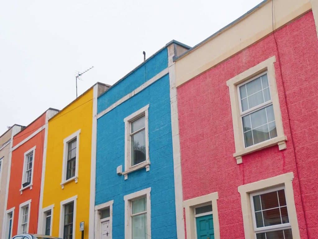 Pink, blue yellow and orange houses in Clifton Bristol