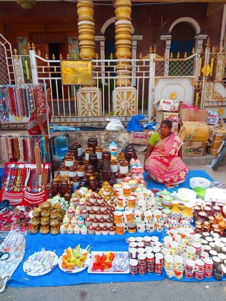 Woman selling ceramics Sunday Market Pondicherry