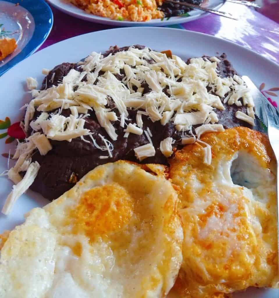 Enfrijoladas Mexican dish with beans and egg