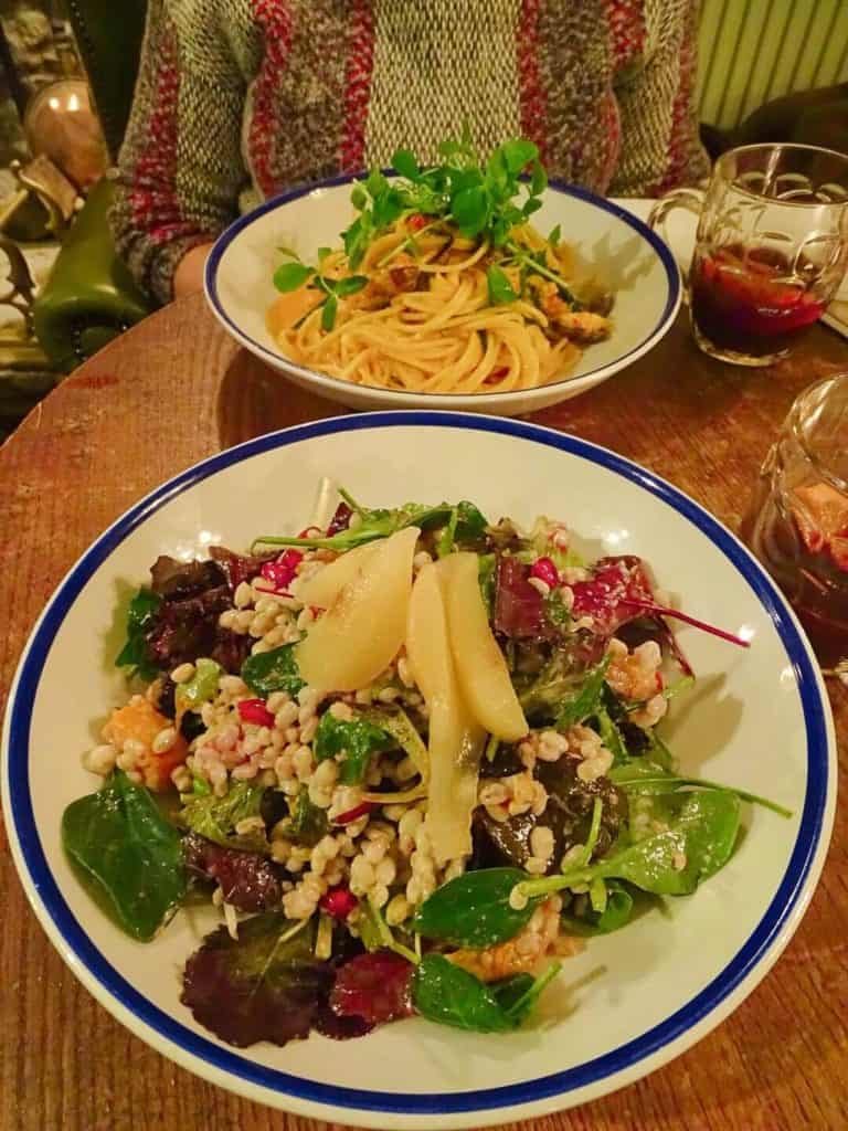 Plates of salad and pasta at Woodstock Arms Pub