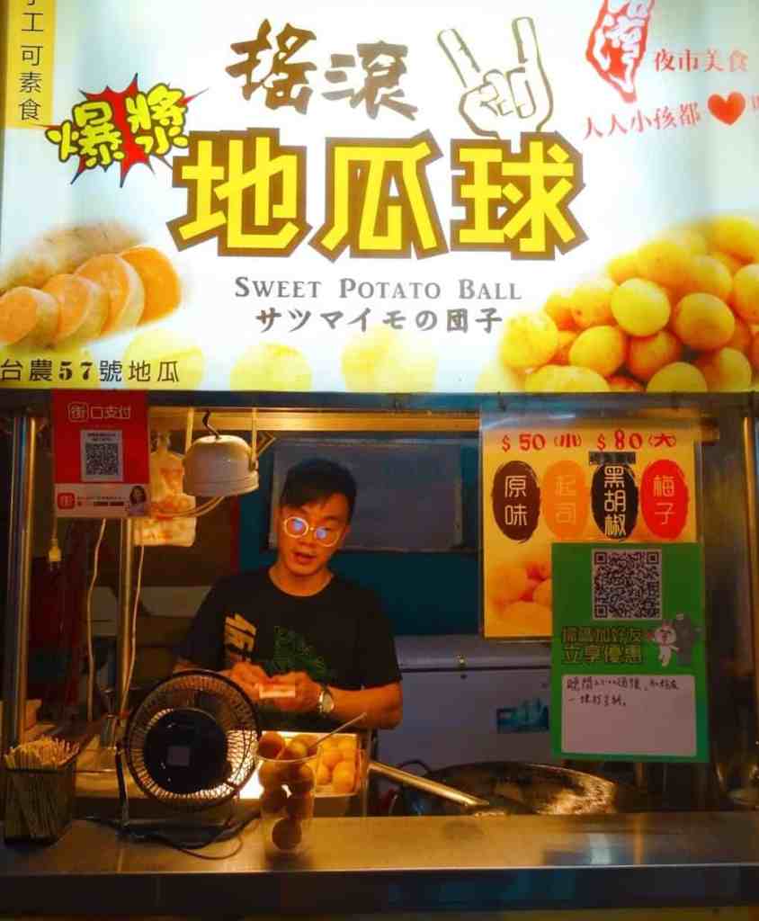 Food vendor selling sweet potato balls