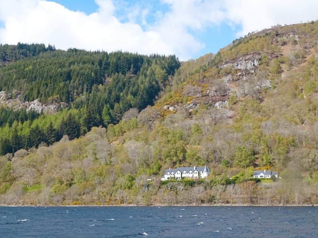 Houses and forest on banks of Loch Ness