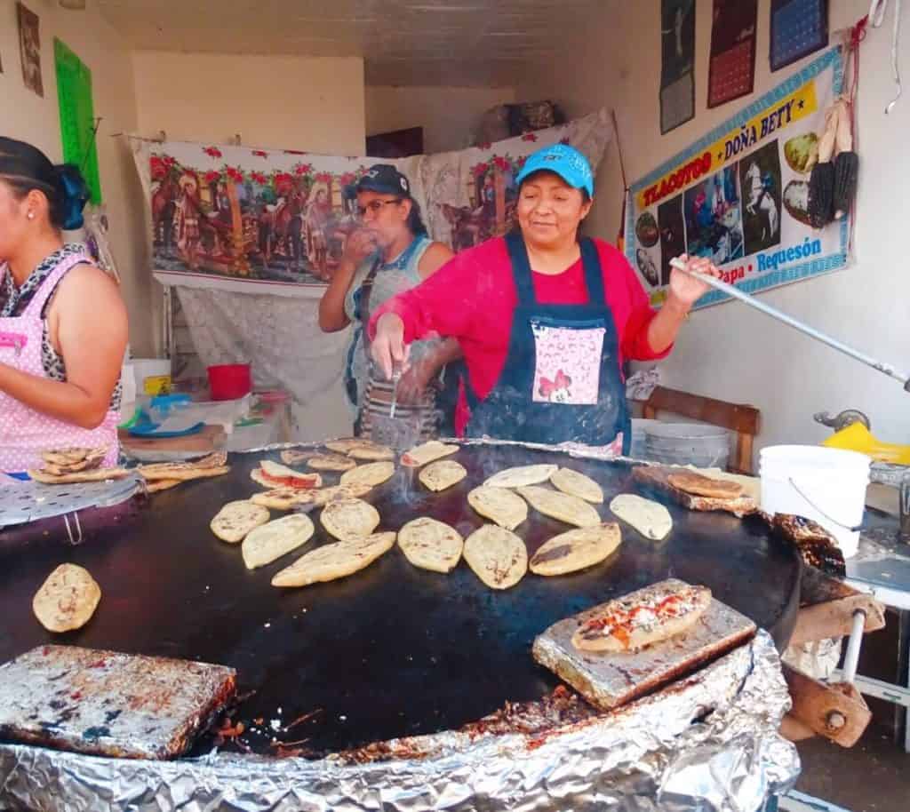 Lady making street food Xochimilco
