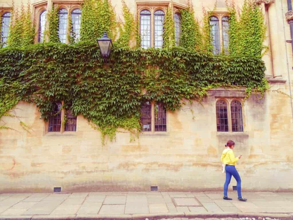 Girl in yellow walking down Merton Street Oxford