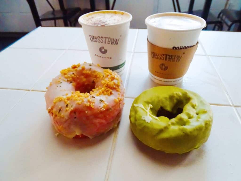 Green and pink doughnuts with coffee Crosstown Doughnuts Spitalfields Market
