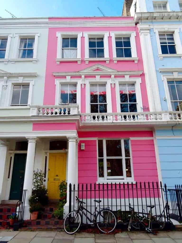 Pink house with bicycle in front Chalcot Square London