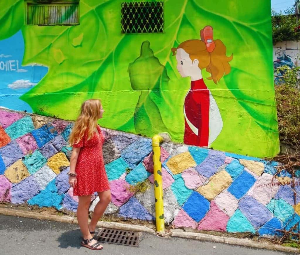 Girl admiring street art things to do jeonju korea