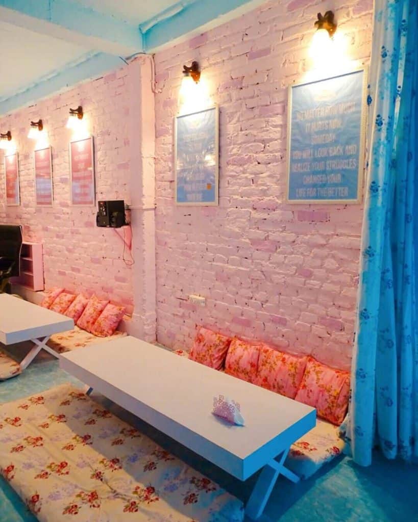 Pink wall Cafe Power of Thoughts Rishikesh 