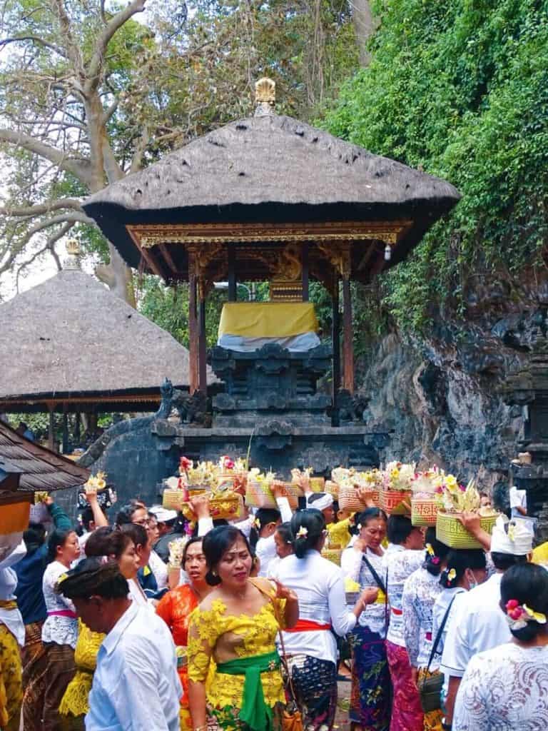 Local celebration at Goa Lawah bat cave temple Ubud