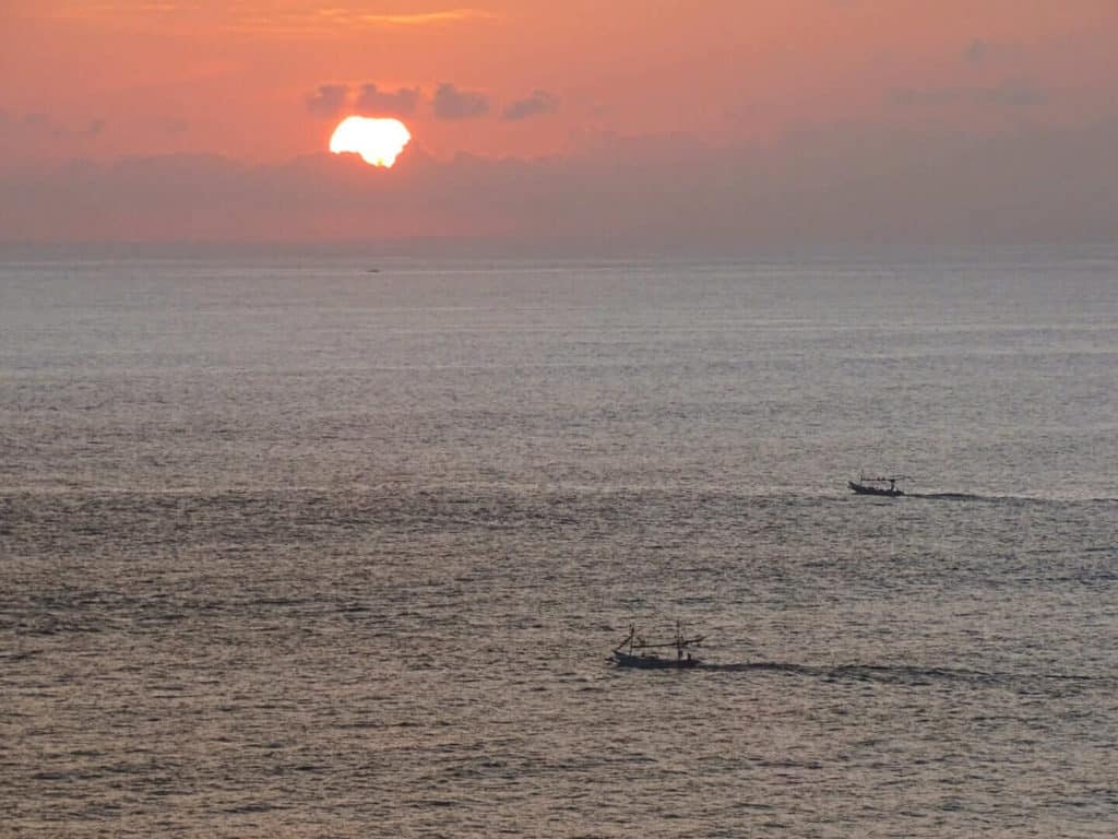 Sunset over sea Uluwatu itinerary