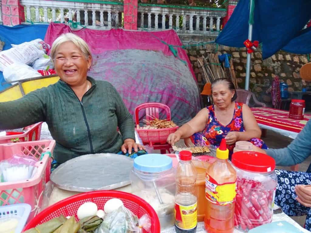 Women serving food Quy Nhon Vietnam