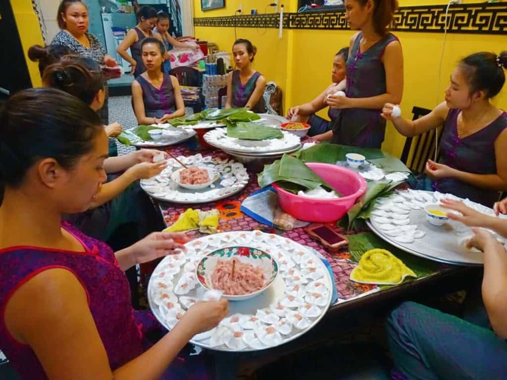 Women making dumplings Hoi An street food
