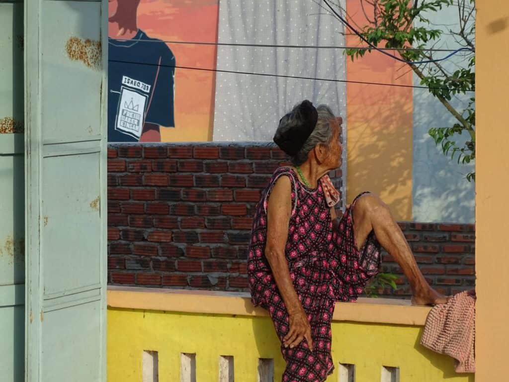 Old lady at street art Village