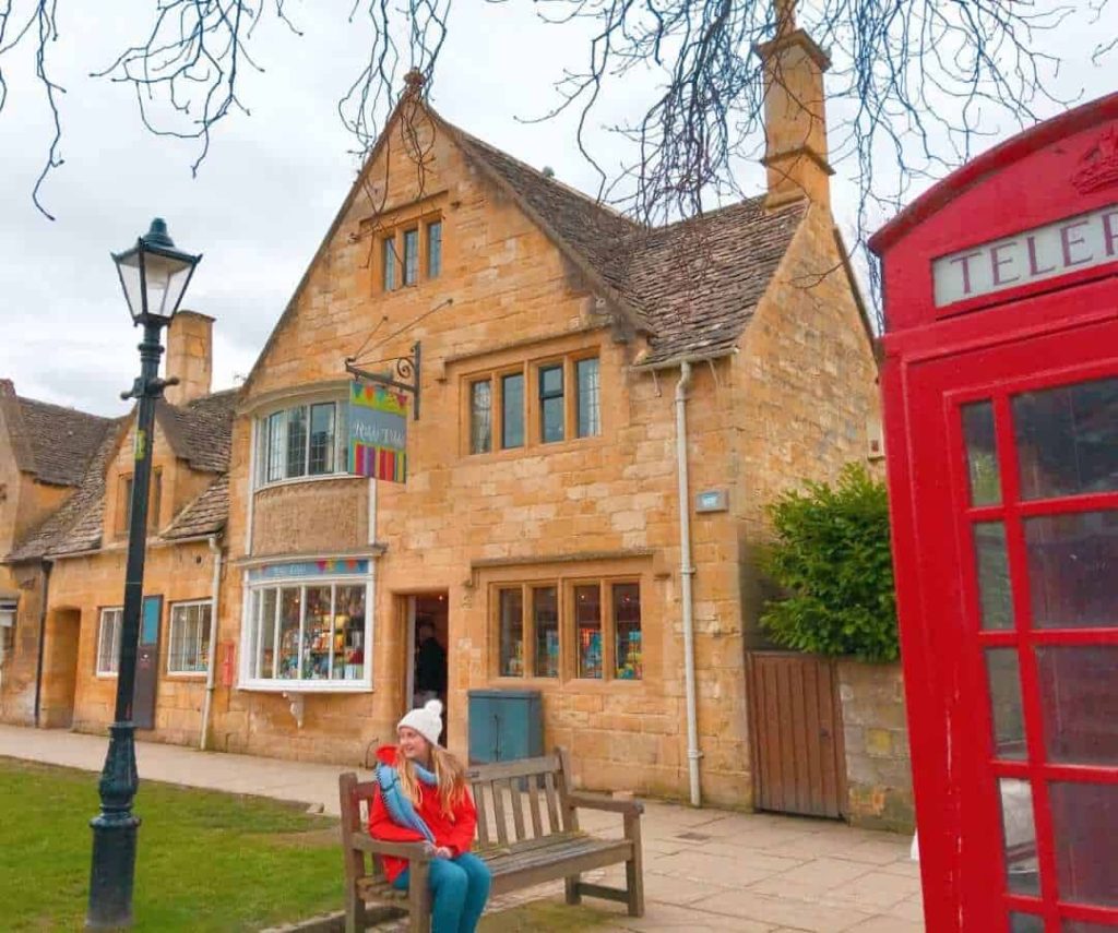 Broadway town centre with red post box Cotswolds