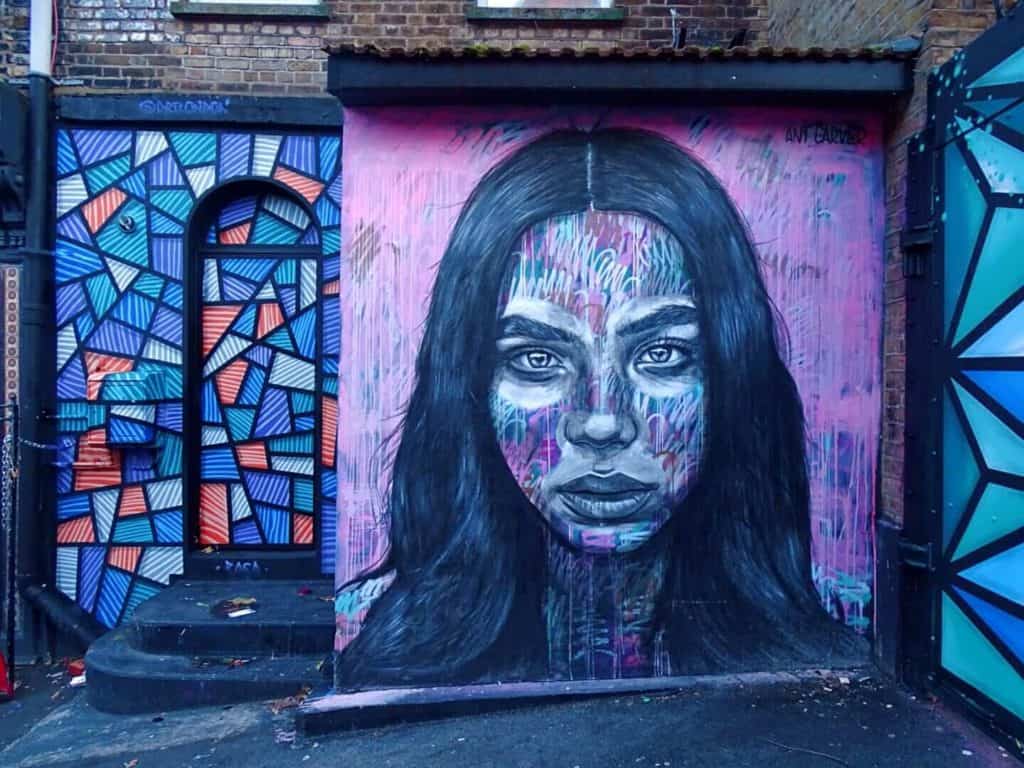 Purple girl street art Camden