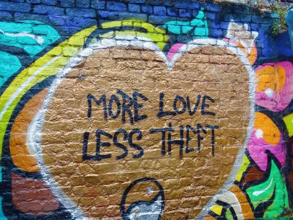 More Love Less theft graffiti Brick Lane 