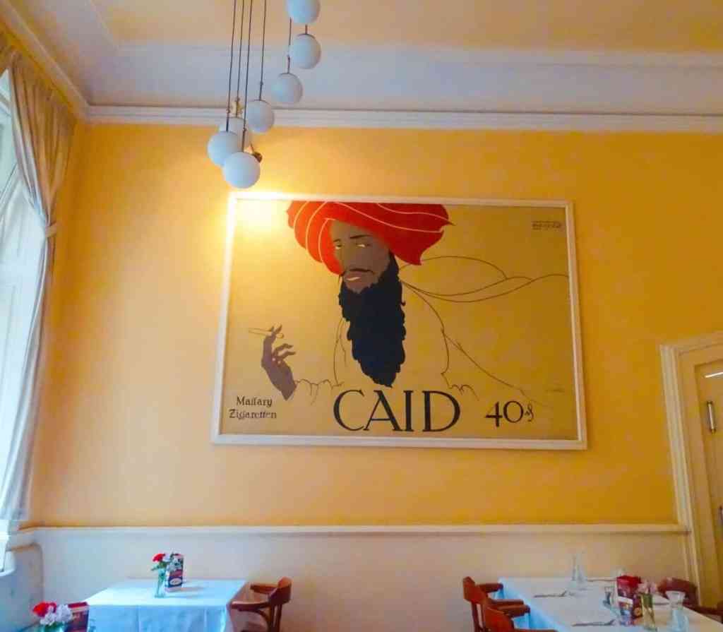 Wall art inside Cafe Louvre Prague