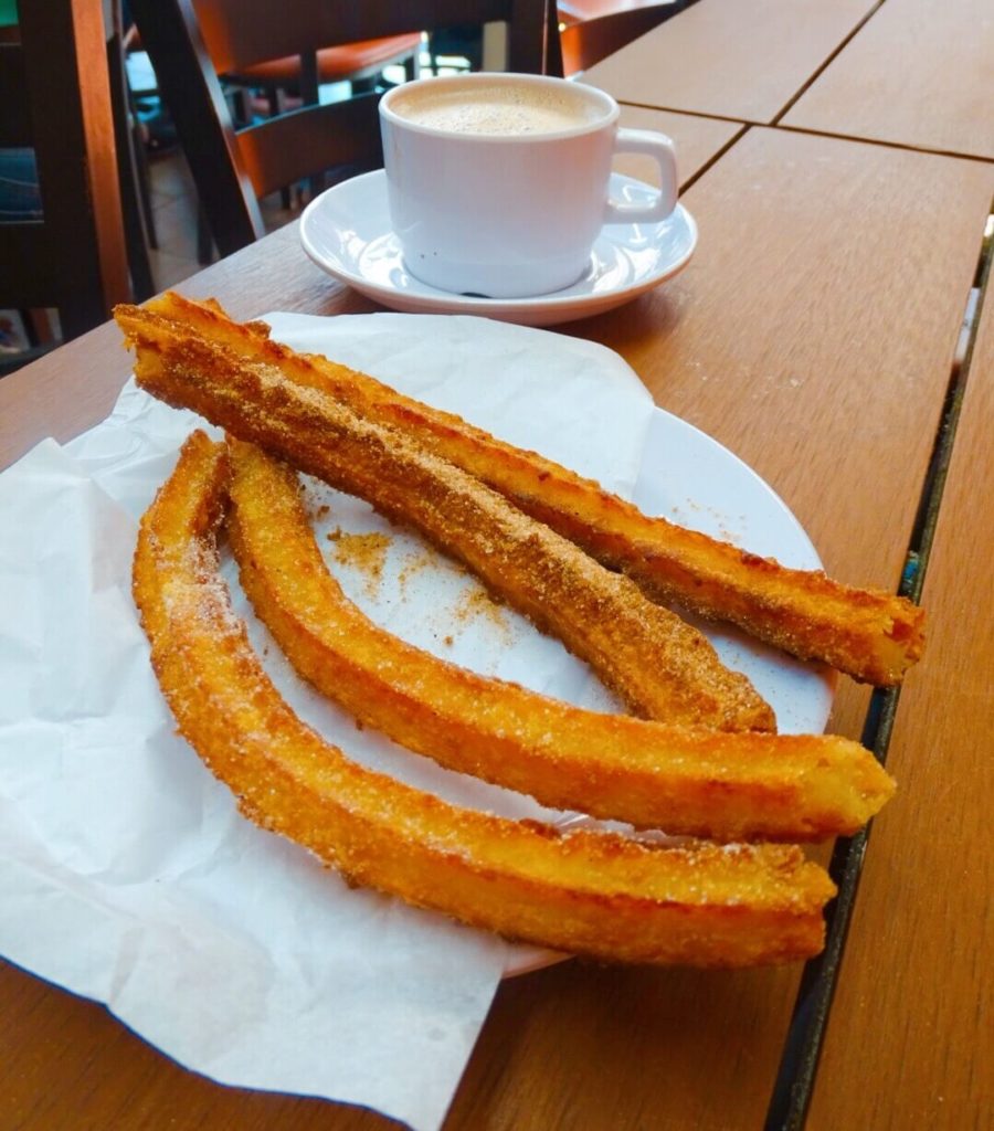 Four churros and hot chocolate in Puebla