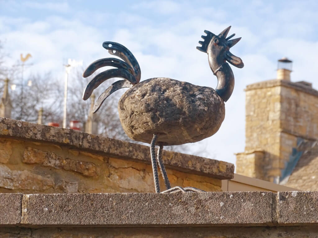 Chicken statue upper slaughter cotswolds