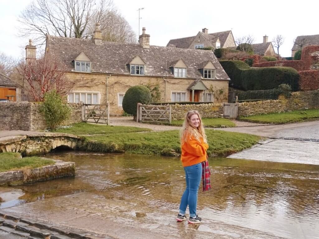 Paddling in ford at upper slaughter cotswolds